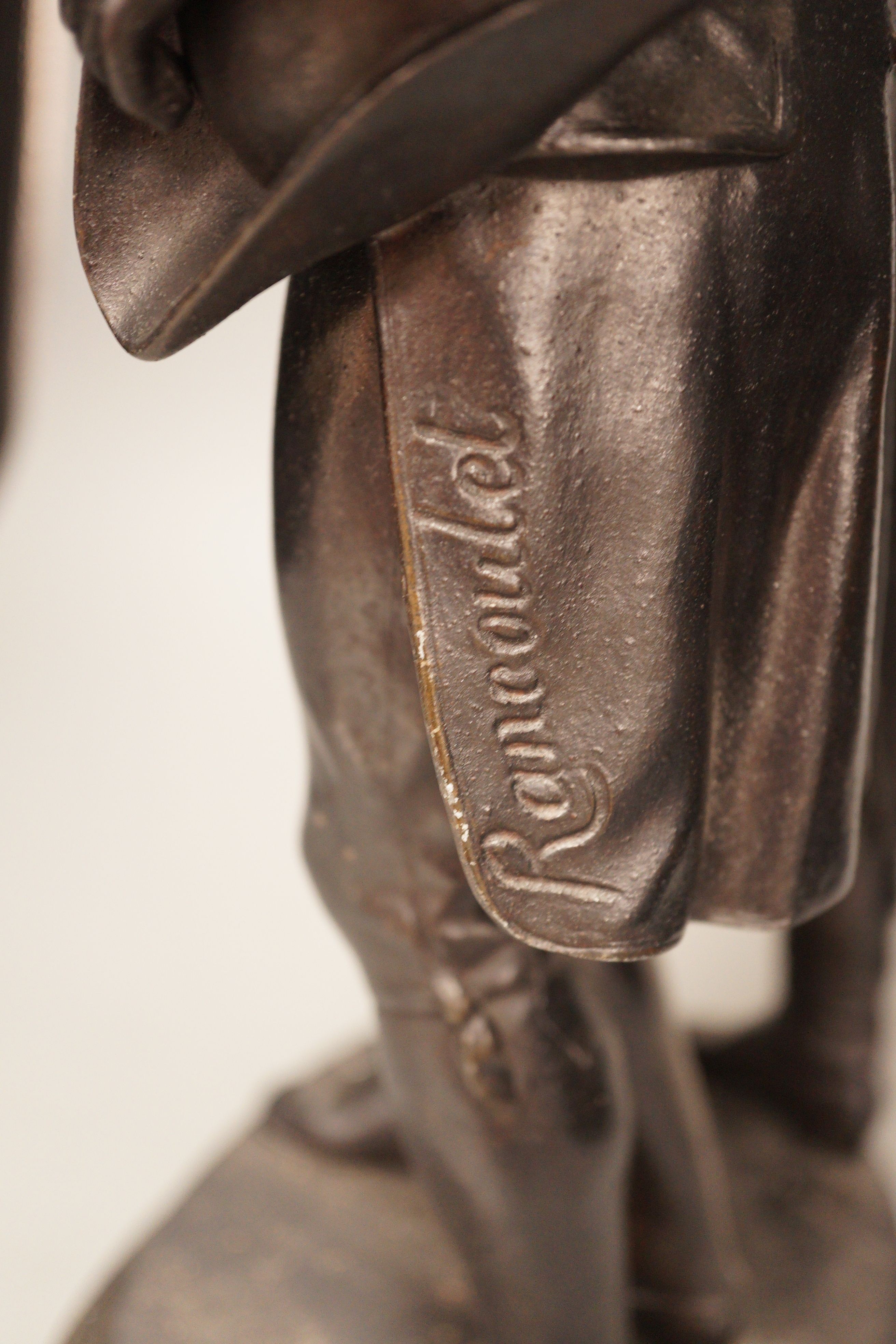 A black patinated spelter group, two 18th century figures in conversation, 48cm tall